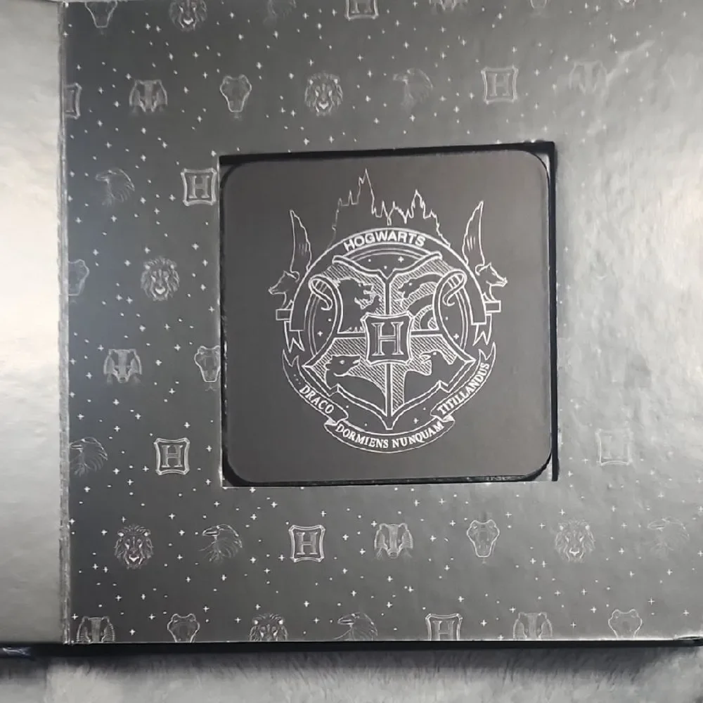 Harry Potter Hogwarts Coaster Book - Gold and Black